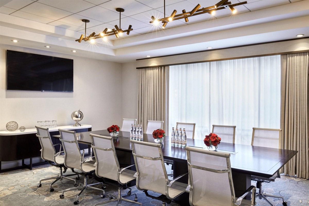 Executive Board Room with leather chairs and a long conference table